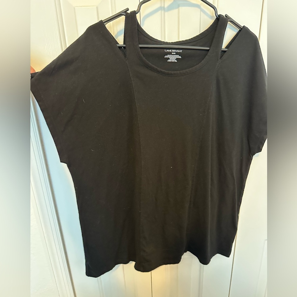 Plus size, black t-shirt with cut-out details on the shoulders from Lane Bryant.